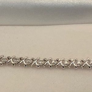 ICE CZ Tennis Style Bracelet, stylish piece to wear with an array of outfits. 7”